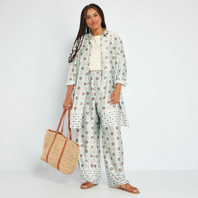 بنطلون ساتان واسع الساق باللون الأبيض