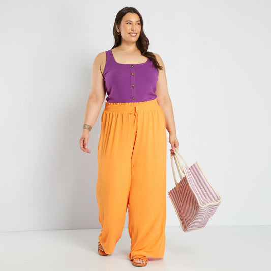 Flowing crêpe fabric trousers orange