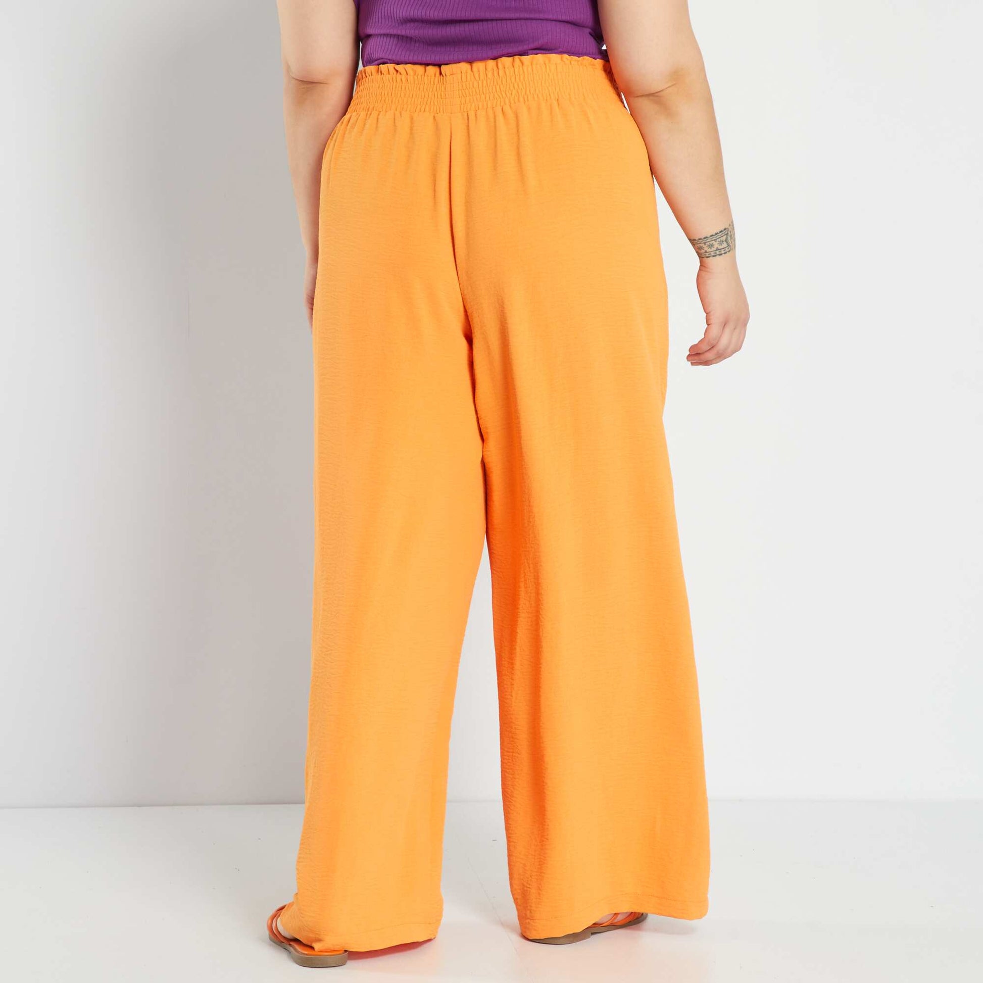 Flowing crêpe fabric trousers orange